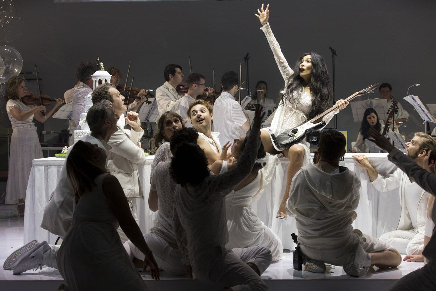 Cathy-Di Zhang as La Folie and the chorus of Platée