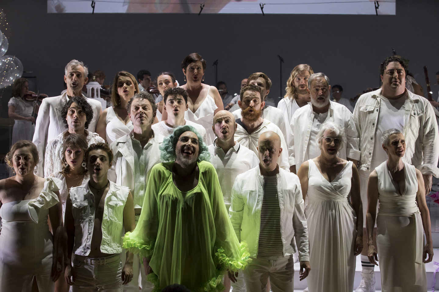 Kanen Breen as Platée with the chorus