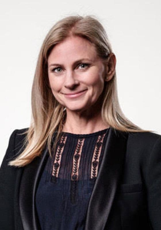 Headshot of Ilona Brooks, a smiling woman with long blonde hair.